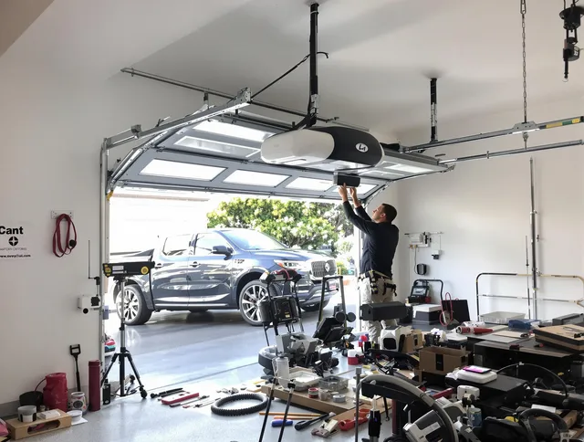 Ipswich Garage Door Repair specialist installing smart garage door opener system in Ipswich home
