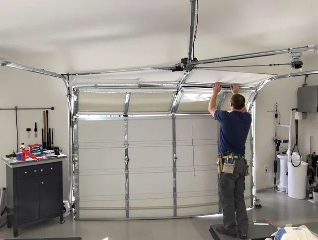 Ipswich Garage Door Repair specialist performing precise section replacement on Ipswich garage door